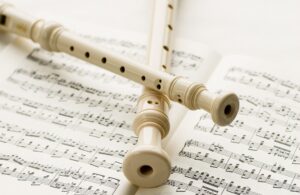 Flutes over musical notes